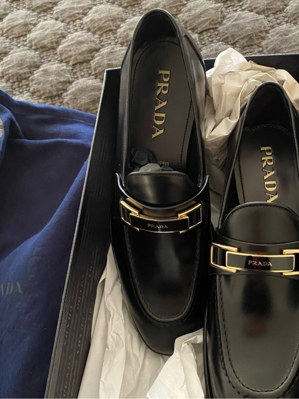 Prada Black Leather Loafers with Gold-Tone Logo Bar